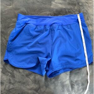 Land’s End blue swim shorts.  Size 16
